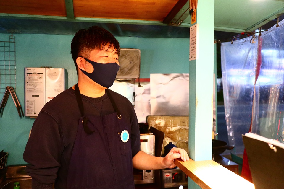 久保田さんの上半身写真